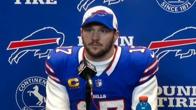 Josh Allen of Buffalo Bills looking on.