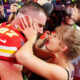 Taylor Swift kissing Travis Kelce