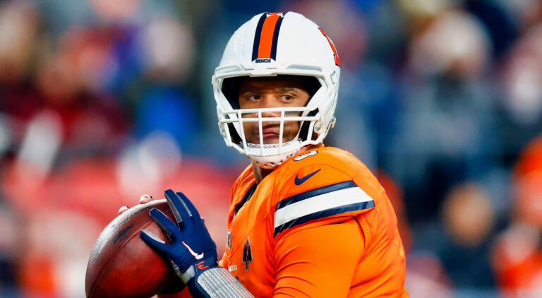 Russell Wilson holding a football