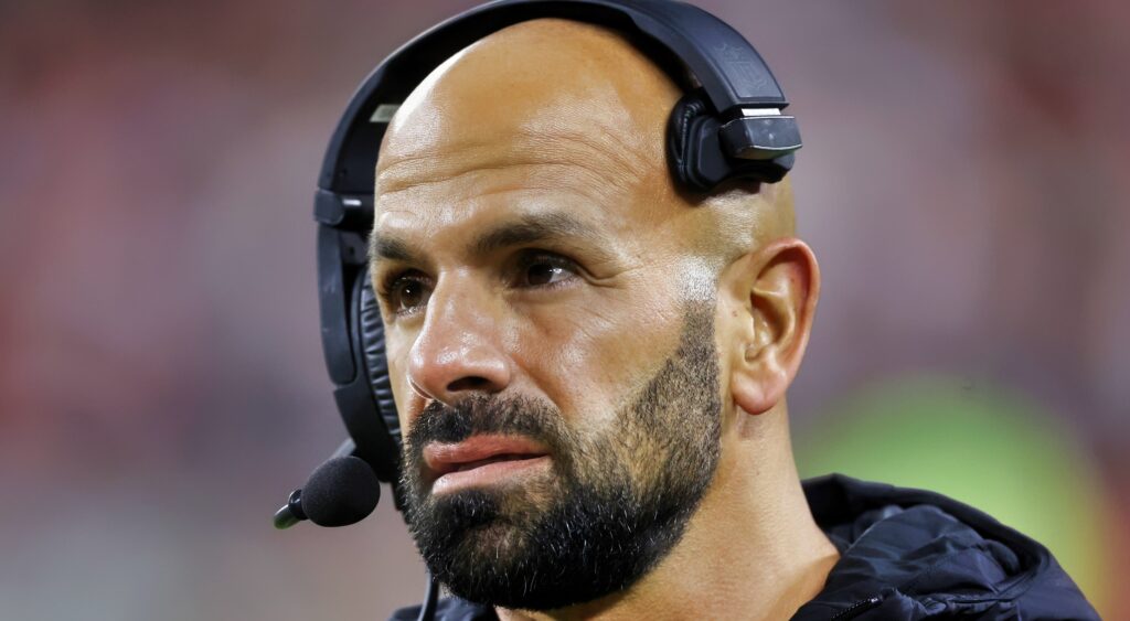 New York Jets head coach Robert Saleh looks on.