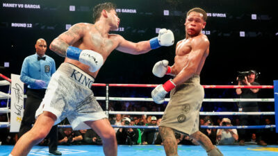 Ryan Garcia throwing a punch at Devin haney