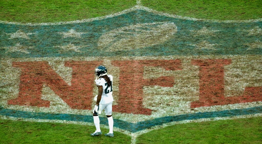 Eagles player walks on the field during an NFL International Series game.