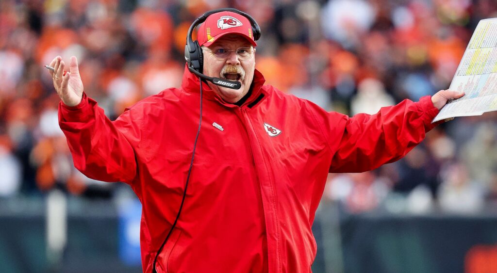 Kansas City Chiefs head coach Andy Reid with his arms held out.