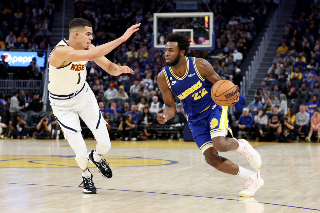 Andrew Wiggins driving against Michael porter Jr.