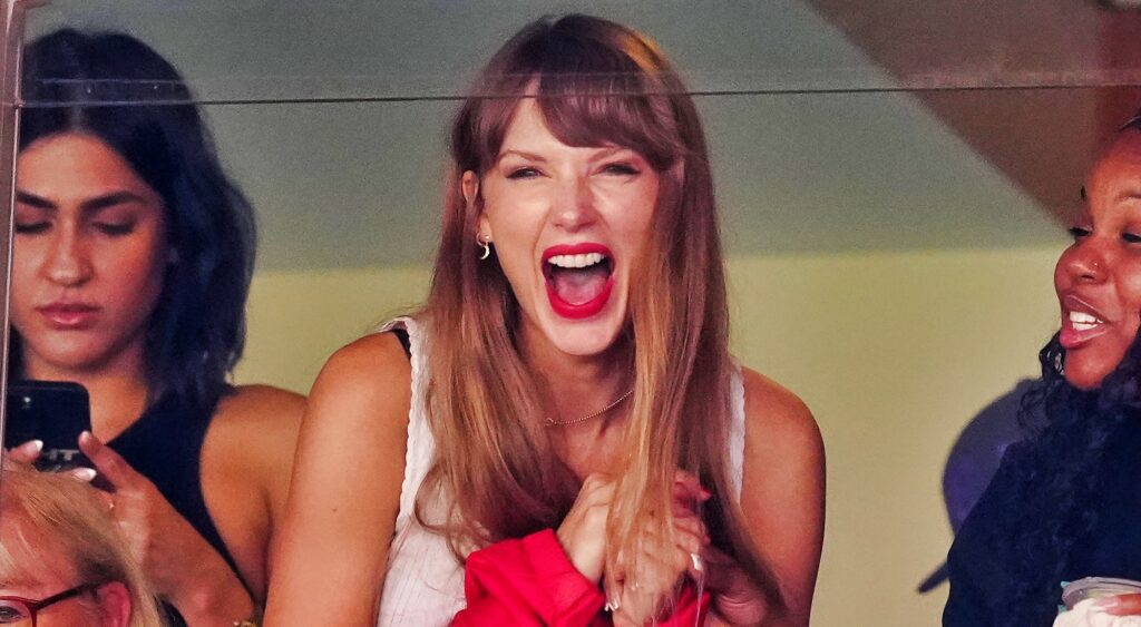 Taylor Swift cheering at the chiefs game.