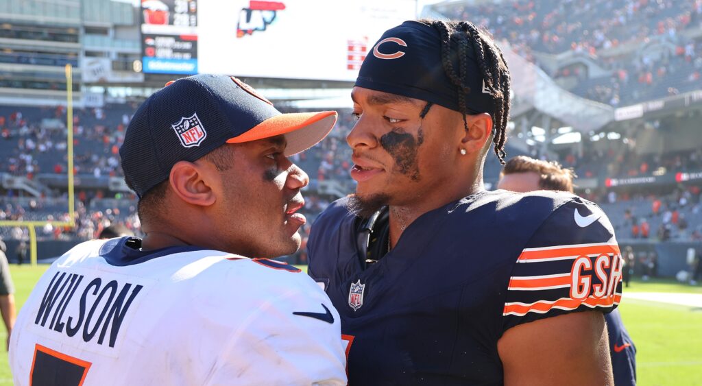 Russell Wilson talking to Justin Fields after game.