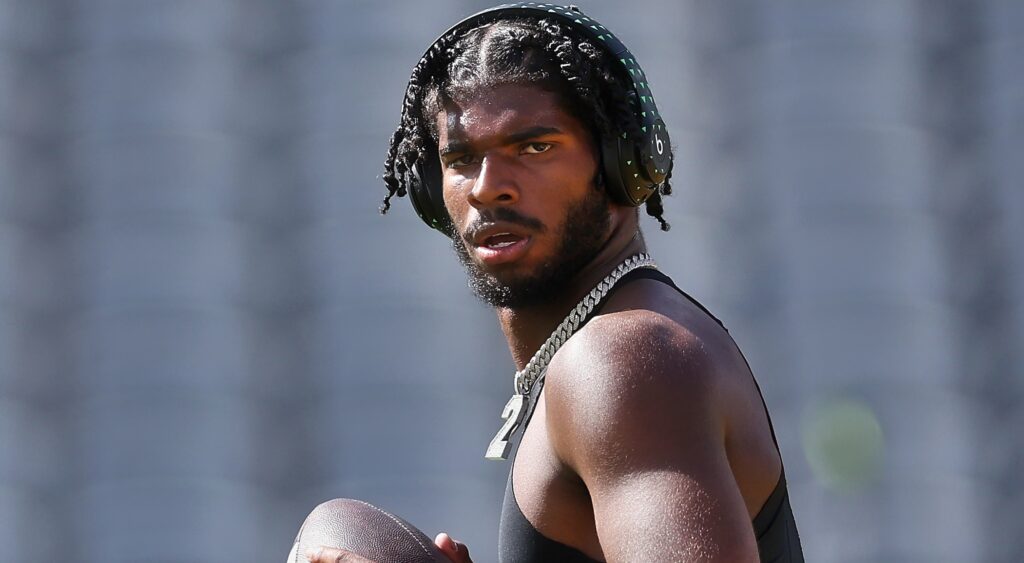 Shedeur Sanders with football