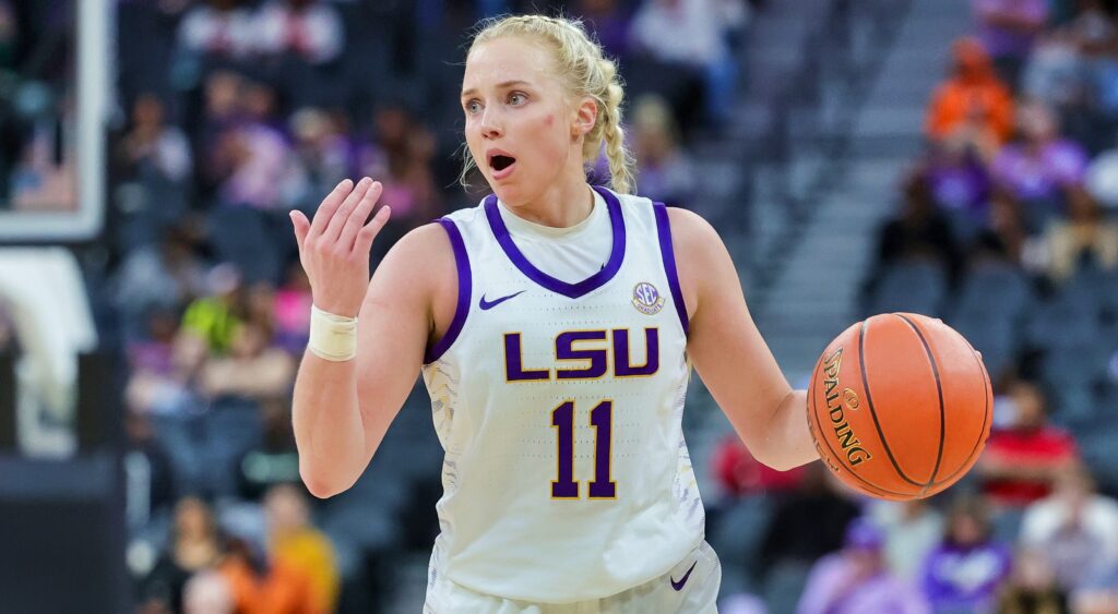 Hailey Van Lith in uniform dribbling basketball