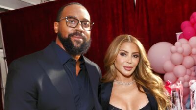 Larsa Pippen and Marcus Jordan posing.