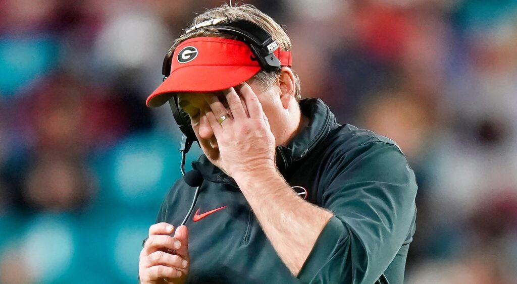 Georgia Bulldogs head coach Kirby Smart with hand on his face