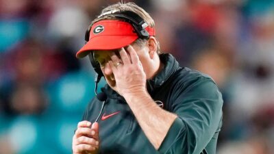 Georgia Bulldogs head coach Kirby Smart with hand on his face