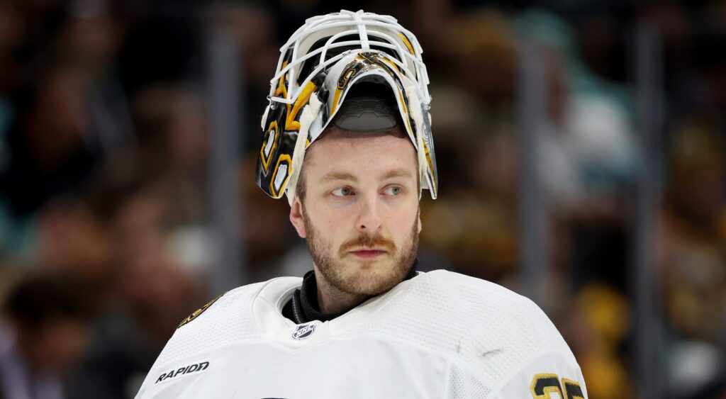 Linus Ullmark of Boston Bruins looking on.