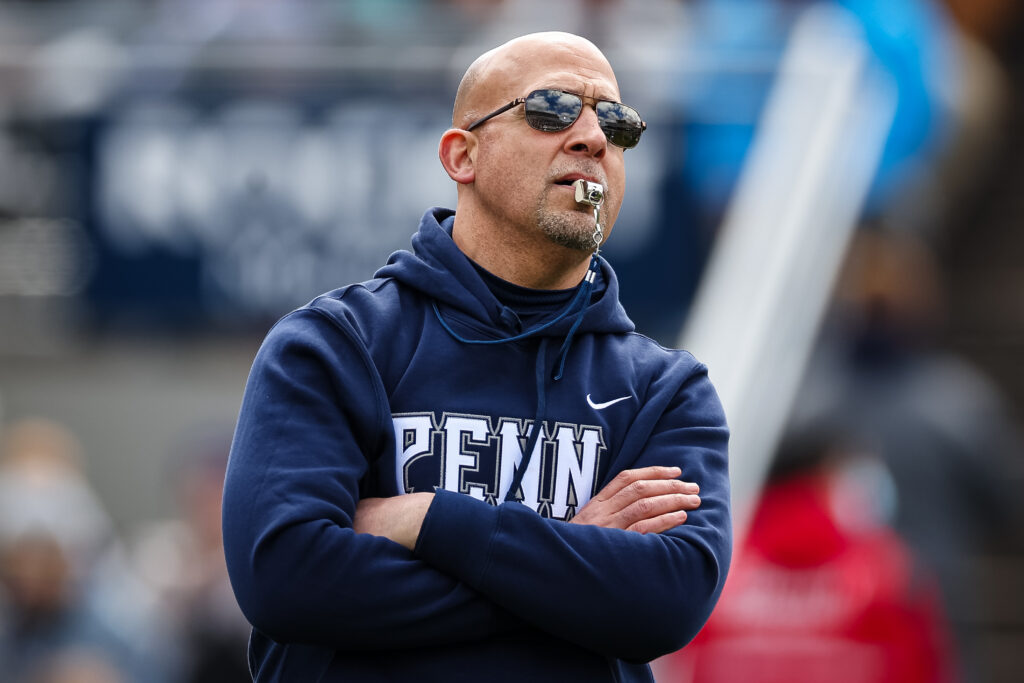 Penn State head coach James Franklin with a whistle in his mouth