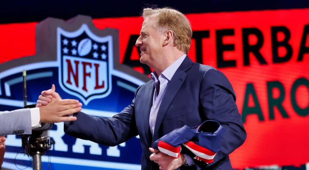 Roger Goodell shakes Drake Maye's hand at the NFL Draft.