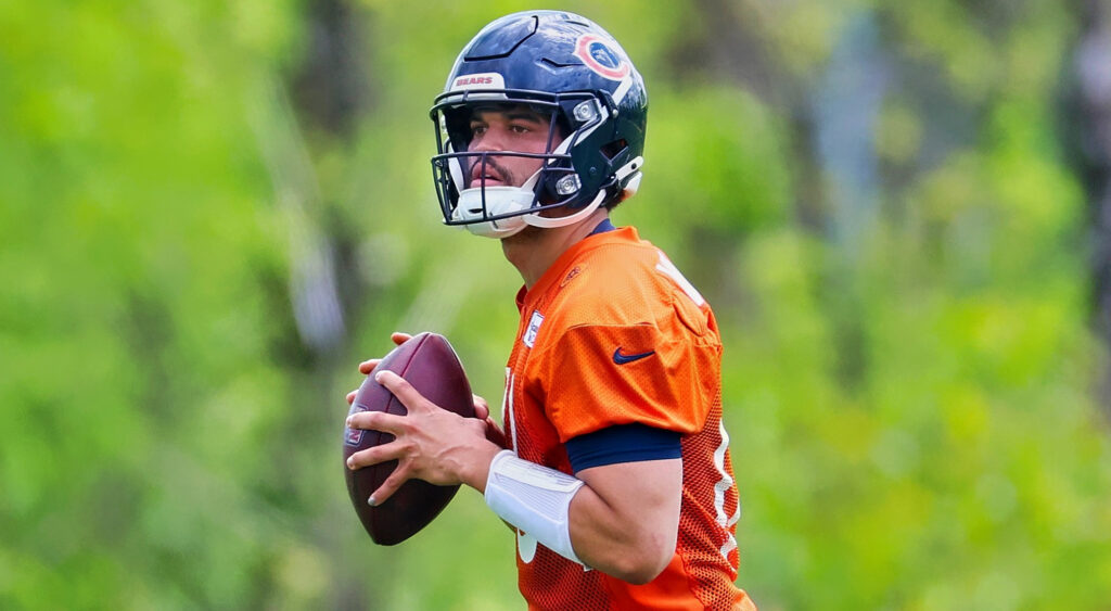 Caleb Williams holding football