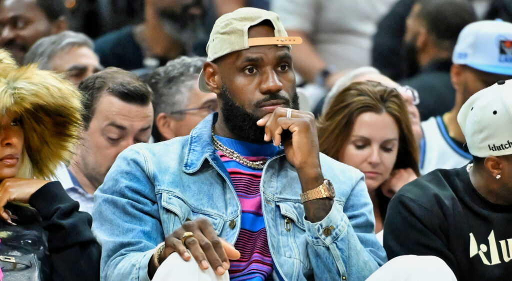 LeBron James sitting courtside at Celtics-Cavaliers game