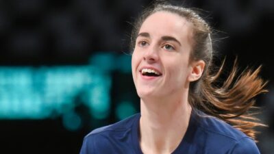 Caitlin Clark in warmups on court.