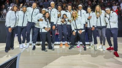 Las Vegas Aces players posing on court