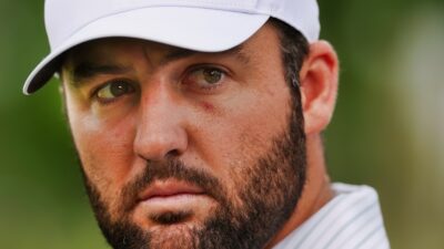 Scottie Scheffler in golf gear on course