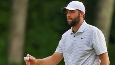 Scottie Scheffler on golf course.