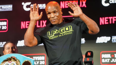 Mike Tyson raising his hands