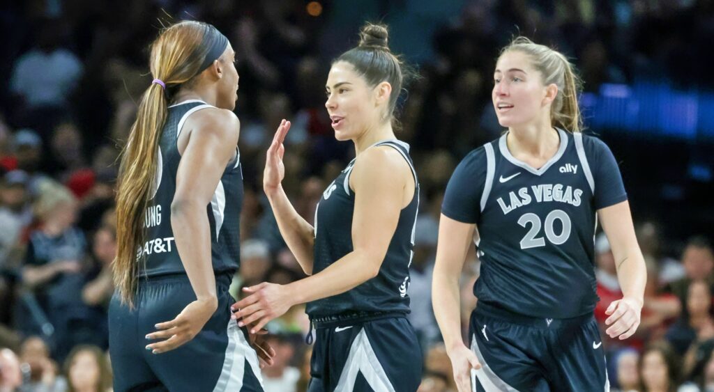 .Jackie Young, Kelsey Plum and Kate Martin react during game.