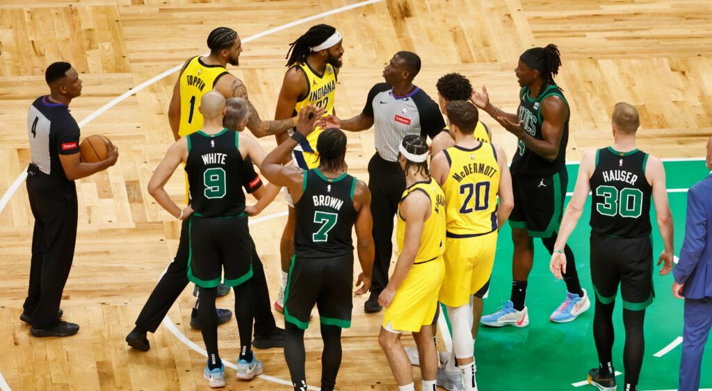 Boston Celtics and Indiana Pacers talking to refs.