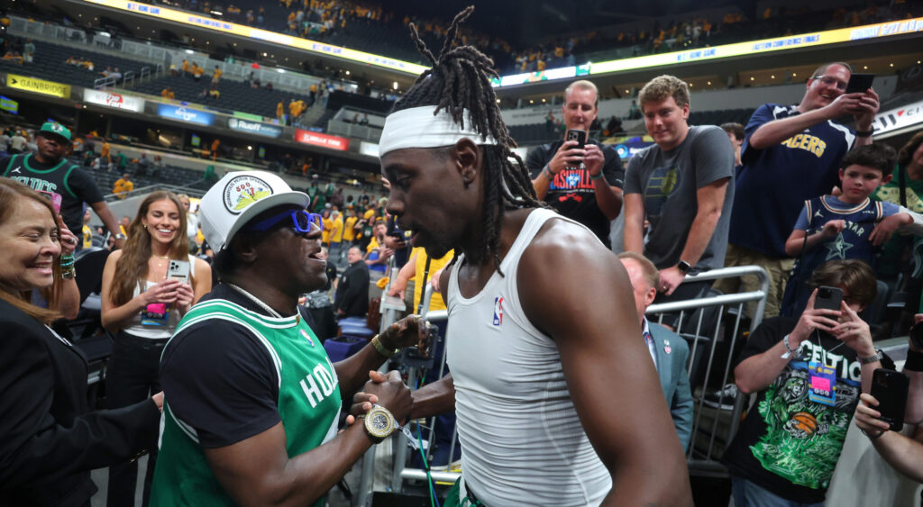 Flavor Flav links up with Jrue Holiday
