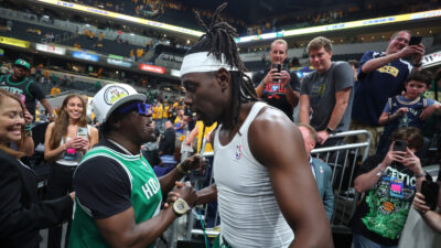 Flavor Flav links up with Jrue Holiday