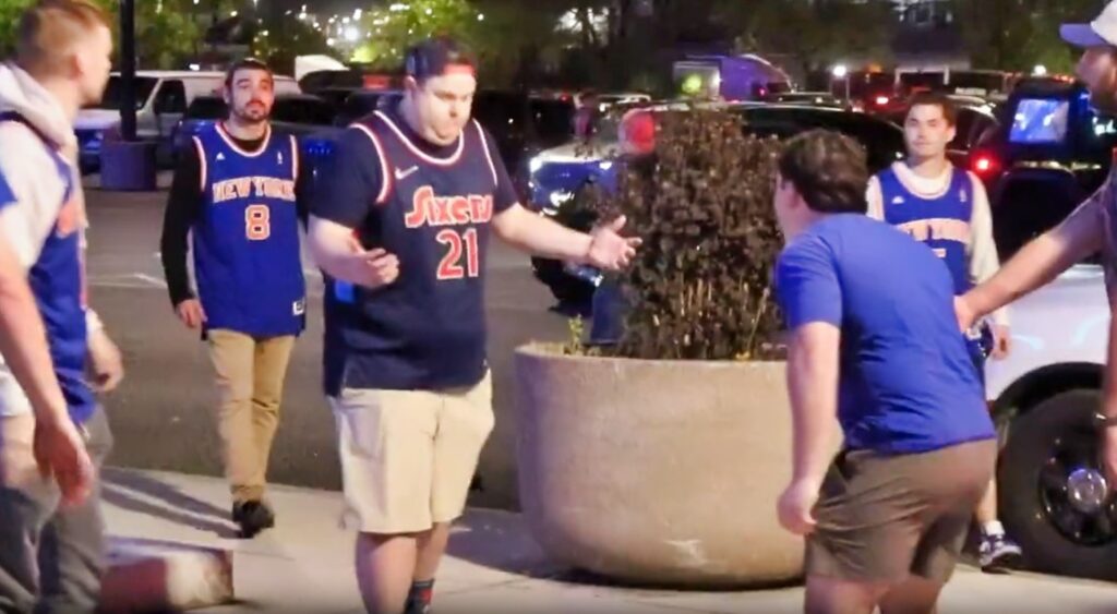 Knicks and 76ers fans outside arena