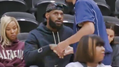 LeBron James sitting next to Savannah James