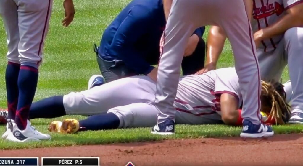 Ronald Acuna Jr. laying on ground