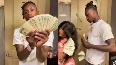 Xavier Worthy showing money with girlfriend