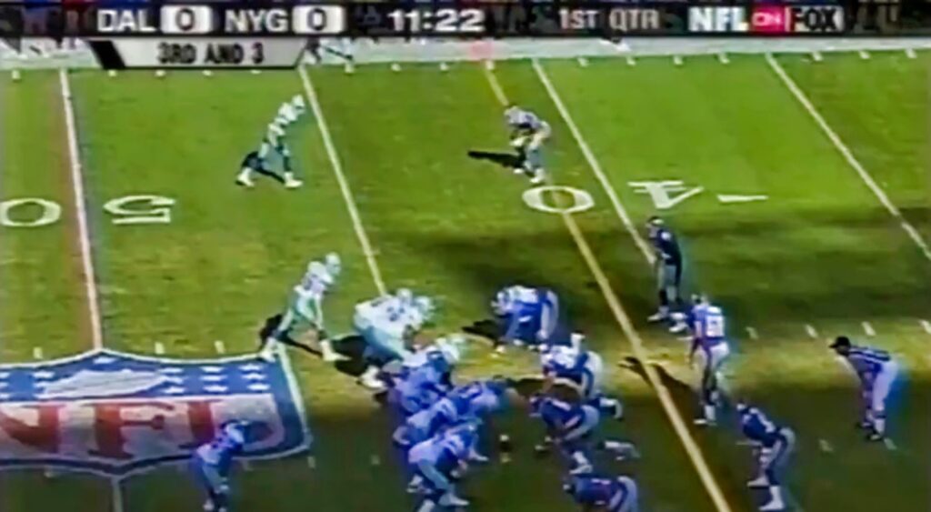 Michael Strahan and the New York Giants line up on defense against the Dallas Cowboys.