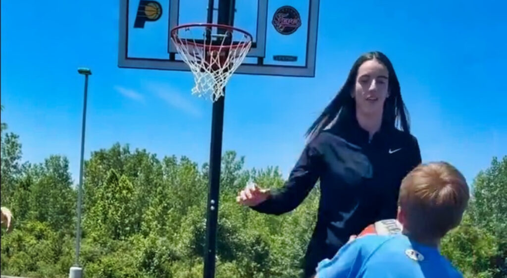 Caitlin Clark playing 1-on-1 with kid