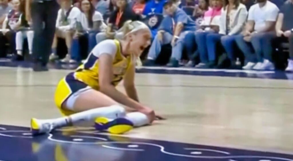 Cameron Brink screams in pain on the court.