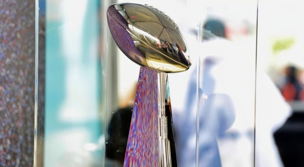 Vince Lombardi Trophy on display. ESPN's computer model has the 49ers beating the chiefs in Super Bowl 59