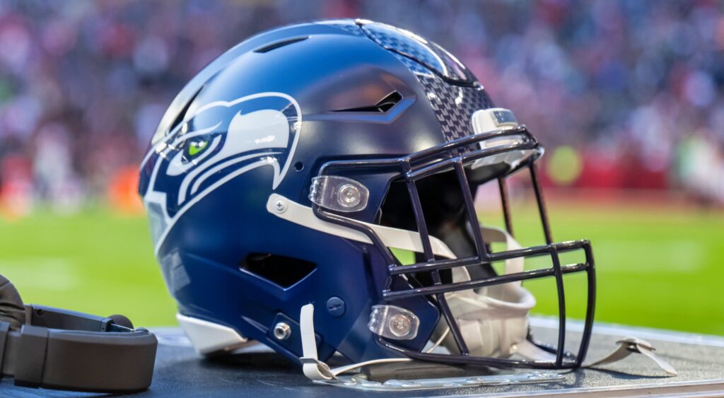 Seattle Seahawks helmet shown on field.