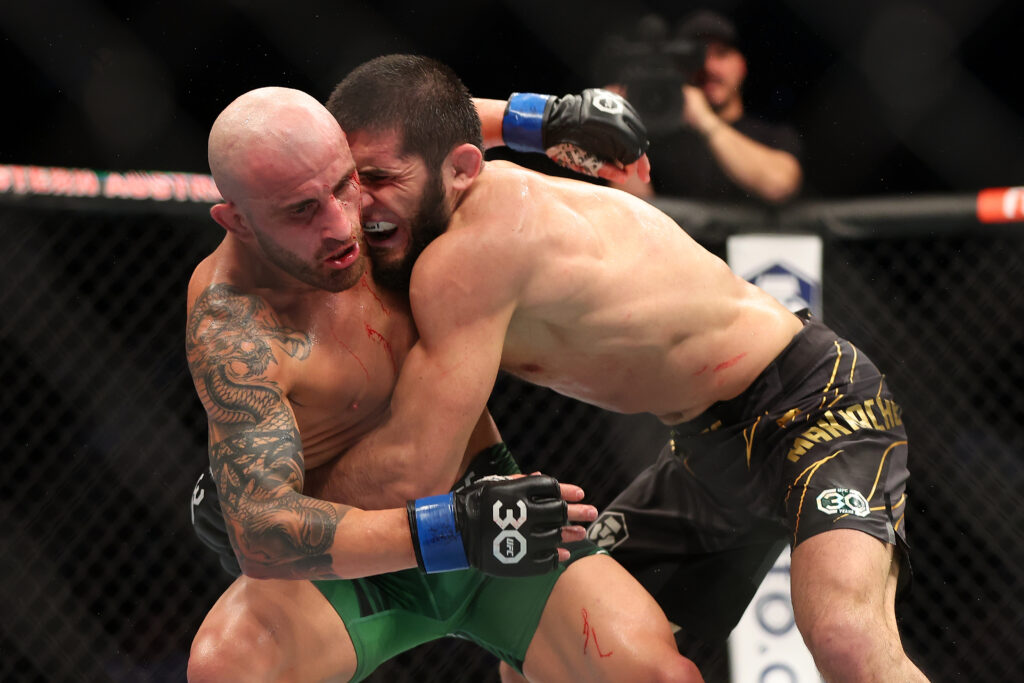 Alex Volkanovski of Australia battles Islam Makhachev of Russia 