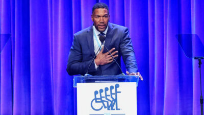 Michael Strahan on podium