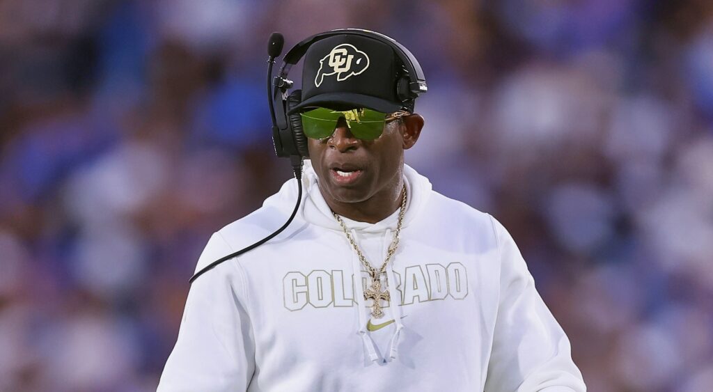 Deion Sanders of Colorado Buffaloes looking on.