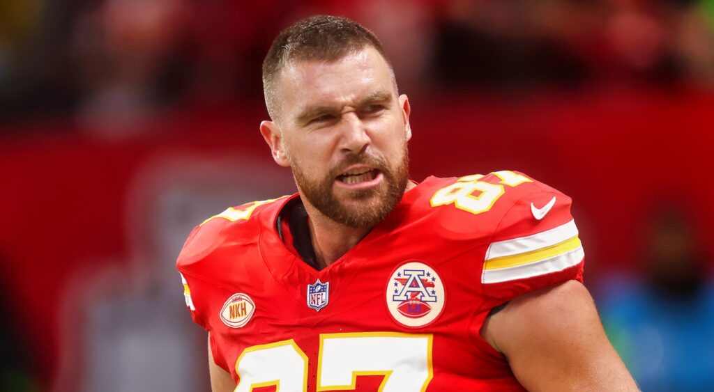 Travis Kelce of Kansas City Chiefs looking on.