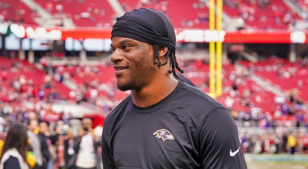 Lamar Jackson of Baltimore Ravens looking on.