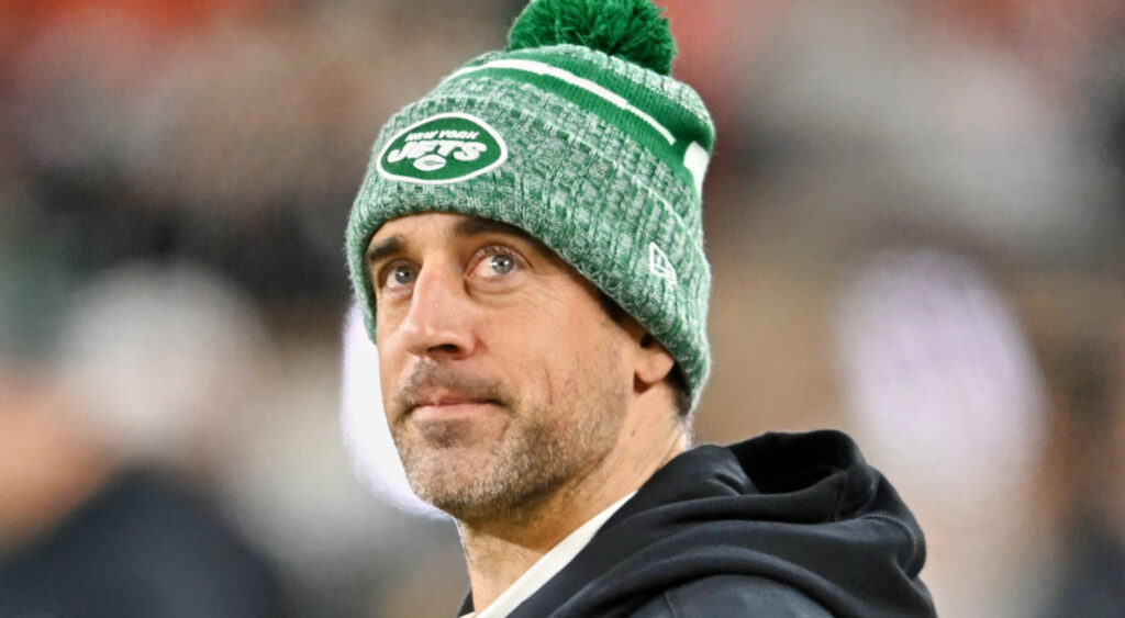 Aaron Rodgers wearing Jets beanie