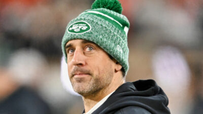 Aaron Rodgers wearing Jets beanie