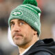 Aaron Rodgers wearing Jets beanie