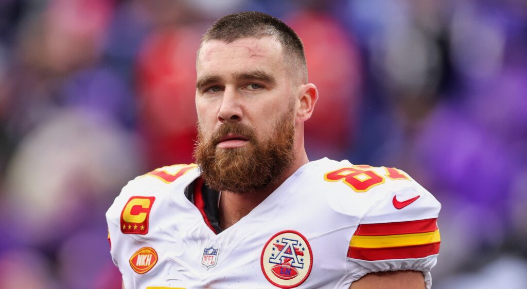 Travis Kelce of Kansas City Chiefs looking on.