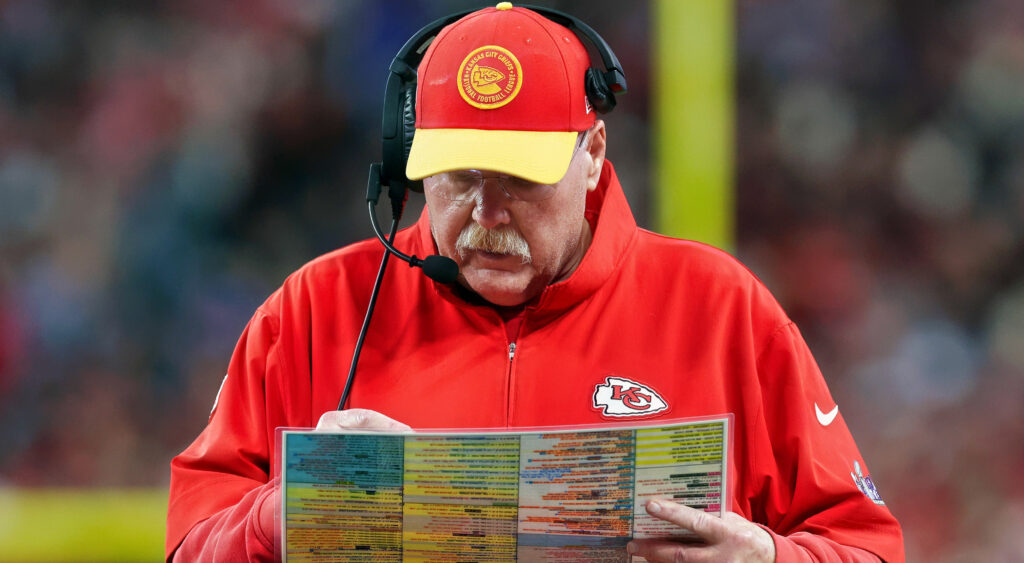 Kansas City Chiefs head coach Andy Reid holding play sheet