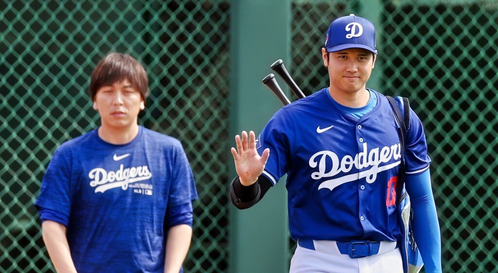 Ippei Mizuhara and Shohei Ohtani look on.