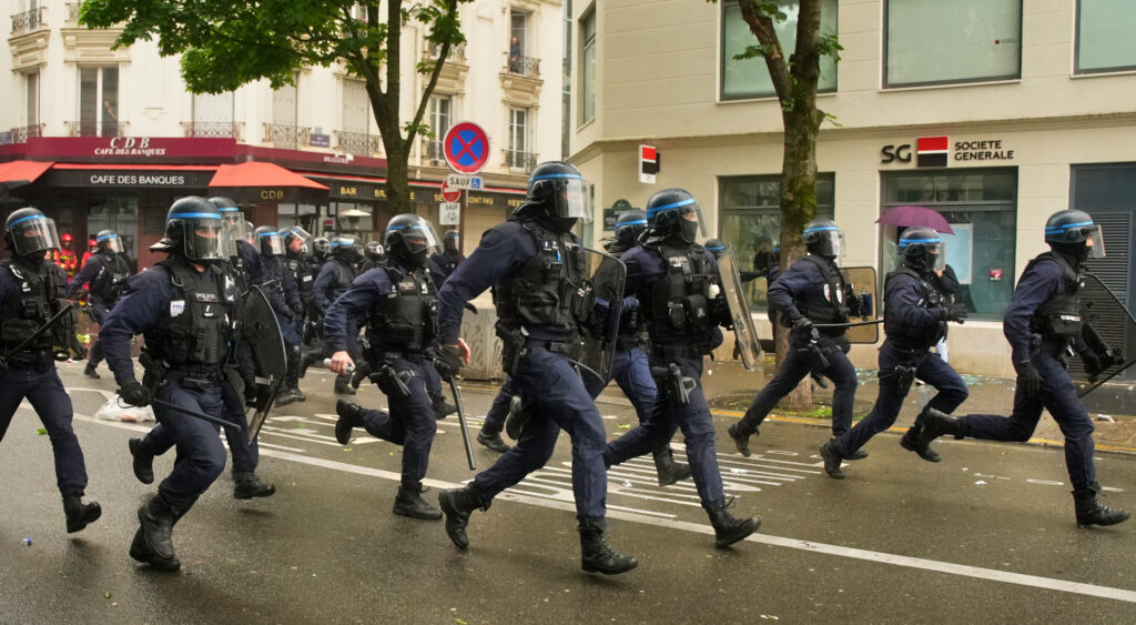 French anti-riot police running